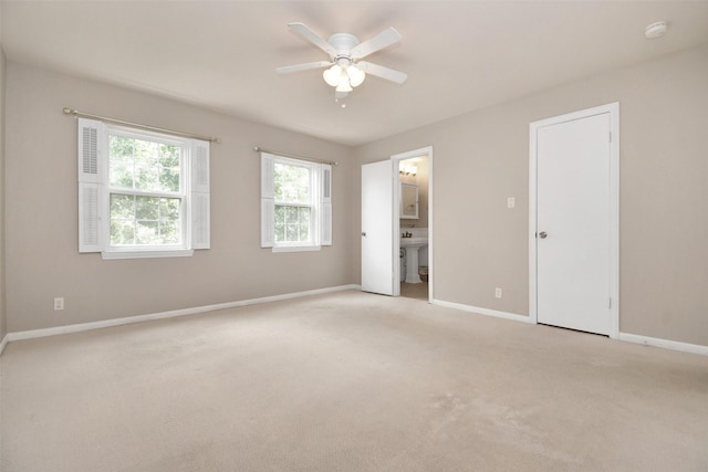 6307 Briar Rose Dr Unit 120, Houston, TX 77057 - unfurnished bedroom with light colored carpet, ensuite bathroom, and a ceiling fan