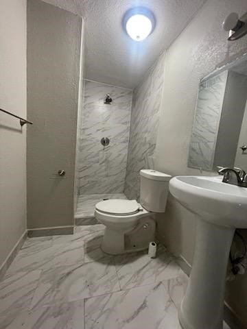 1114 E Pecan St, Angleton, TX 77515 - bathroom with a shower stall and marble look tile flooring
