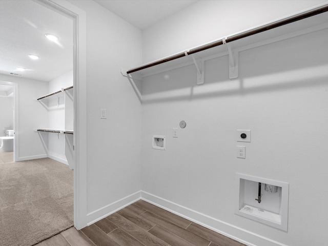 10806 Capella Creek Way, Richmond, TX 77406 - laundry area featuring hookup for an electric dryer, washer hookup, gas dryer hookup, wood finished floors, and recessed lighting