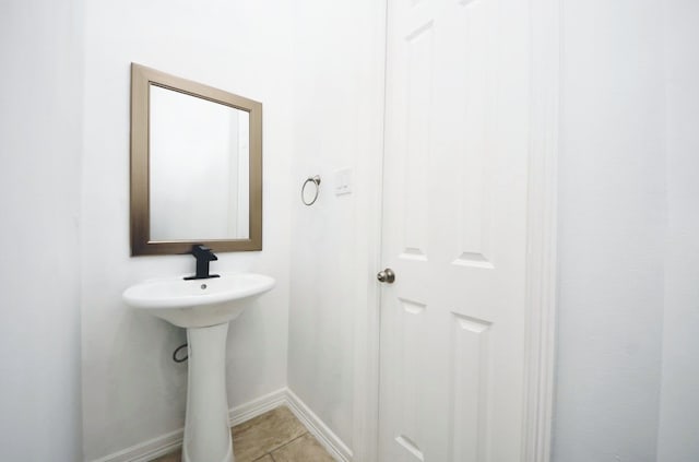 16015 Conners Ace Dr, Spring, TX 77379 - bathroom with tile patterned flooring and baseboards