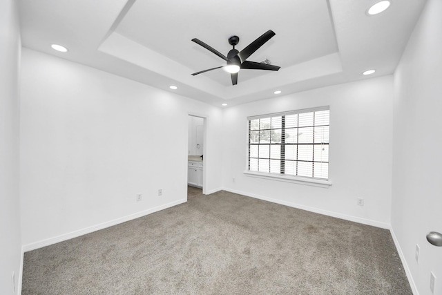 16015 Conners Ace Dr, Spring, TX 77379 - carpeted spare room featuring recessed lighting, a tray ceiling, and ceiling fan