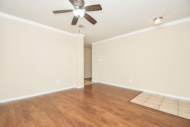 19826 Seagler Glen Ln, Katy, TX 77449 - empty room with crown molding, wood finished floors, and a ceiling fan