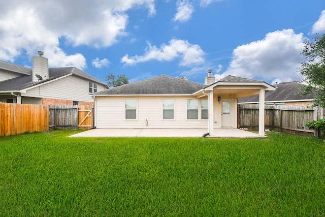 19826 Seagler Glen Ln, Katy, TX 77449 - back of property with a patio, a fenced backyard, and a gate