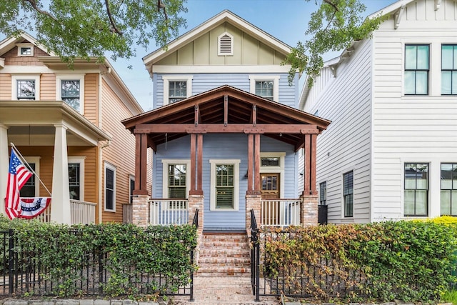 1017 Waverly St Unit B, Houston, TX 77008 - view of front of house with a porch and board and batten siding