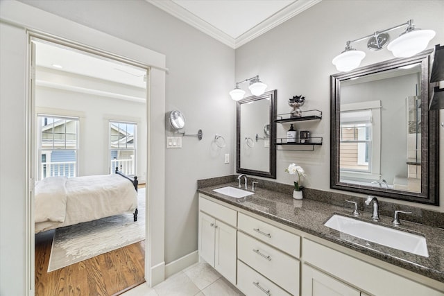 1017 Waverly St Unit B, Houston, TX 77008 - ensuite bathroom with crown molding, double vanity, and tile patterned floors