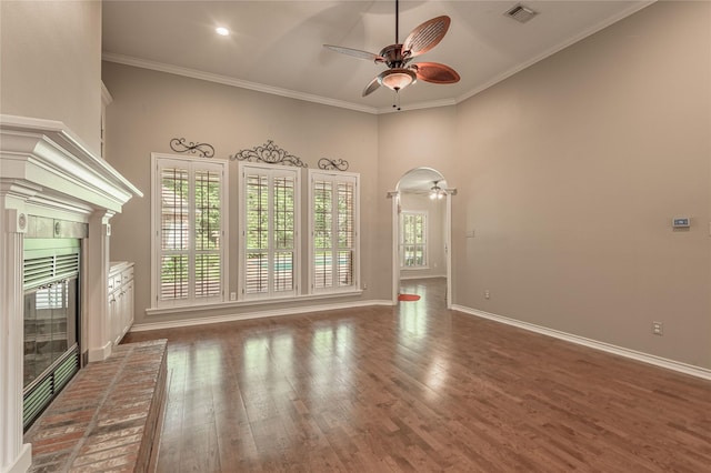 426 County Road 222, Nacogdoches, TX 75965 - unfurnished living room featuring a ceiling fan, wood finished floors, ornamental molding, recessed lighting, and a fireplace