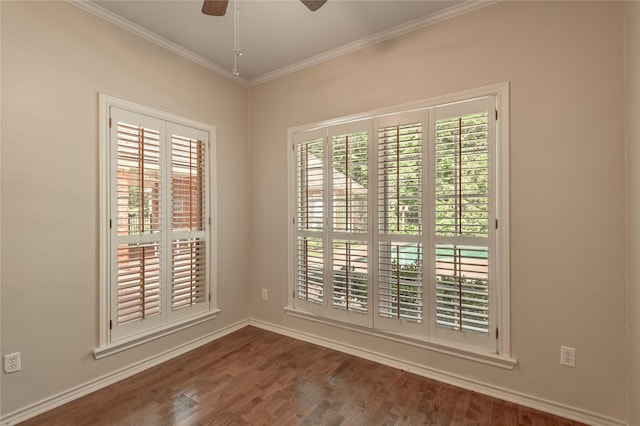 426 County Road 222, Nacogdoches, TX 75965 - spare room featuring wood finished floors, crown molding, and ceiling fan