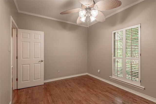 426 County Road 222, Nacogdoches, TX 75965 - empty room with wood finished floors, crown molding, and a ceiling fan