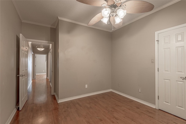 426 County Road 222, Nacogdoches, TX 75965 - spare room featuring ceiling fan, wood finished floors, and crown molding