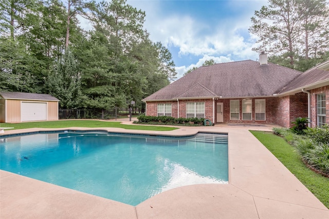 426 County Road 222, Nacogdoches, TX 75965 - view of pool with a storage unit and a patio area