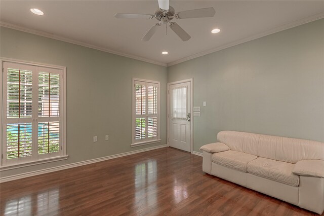 426 County Road 222, Nacogdoches, TX 75965 - living area featuring plenty of natural light, wood finished floors, recessed lighting, ornamental molding, and ceiling fan