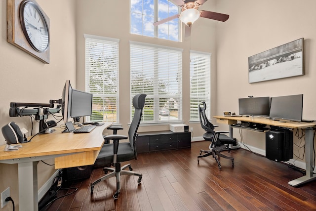 119 Reese Run St, Montgomery, TX 77316 - office space featuring a ceiling fan, dark wood-style floors, plenty of natural light, and a towering ceiling