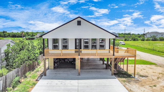 1309 24th St, Dickinson, TX 77539 - view of front of house with a carport and concrete driveway