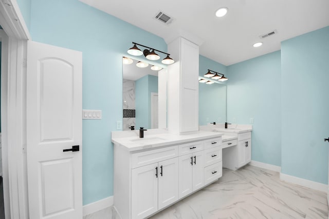 1309 24th St, Dickinson, TX 77539 - bathroom with double vanity, marble look tile flooring, recessed lighting, and a shower