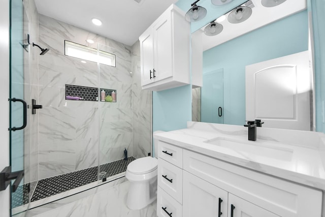 1309 24th St, Dickinson, TX 77539 - bathroom with vanity, marble finish flooring, and a marble finish shower