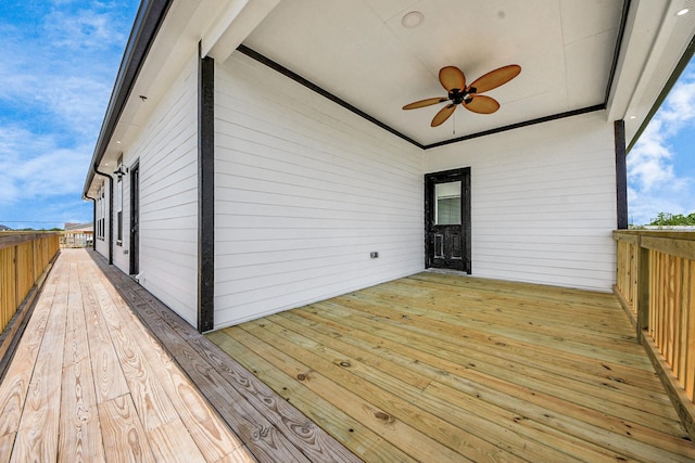 1309 24th St, Dickinson, TX 77539 - wooden terrace with a ceiling fan