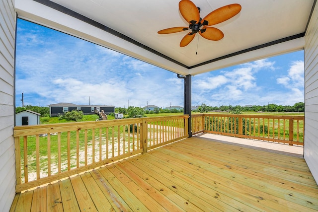1309 24th St, Dickinson, TX 77539 - wooden terrace featuring a ceiling fan and a lawn