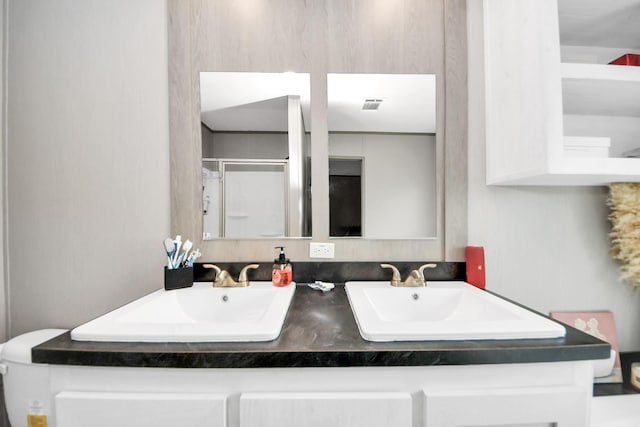 1309 24th St, Dickinson, TX 77539 - full bath with double vanity and a shower stall