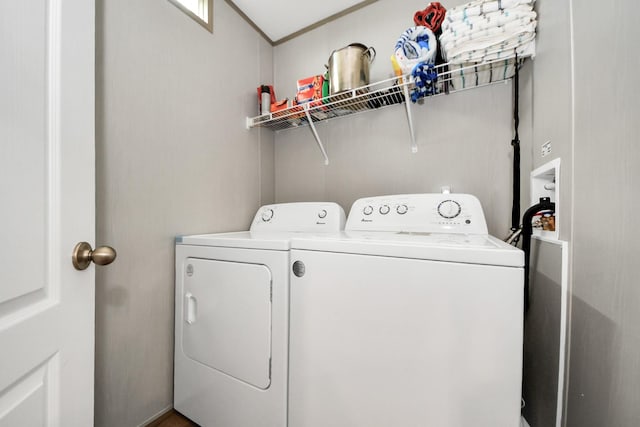 1309 24th St, Dickinson, TX 77539 - laundry room with washer and clothes dryer