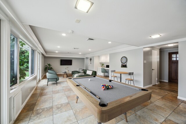 5659 Chevy Chase Dr, Houston, TX 77056 - recreation room featuring billiards table, ornamental molding, light stone finish floors, and a raised ceiling