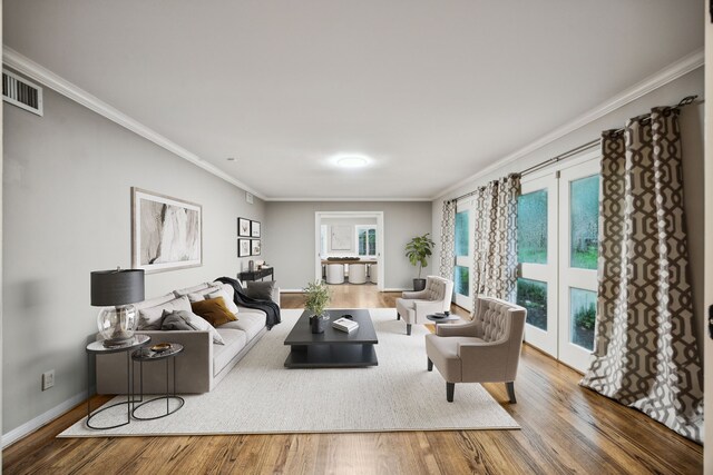 5659 Chevy Chase Dr, Houston, TX 77056 - living room featuring ornamental molding and wood finished floors