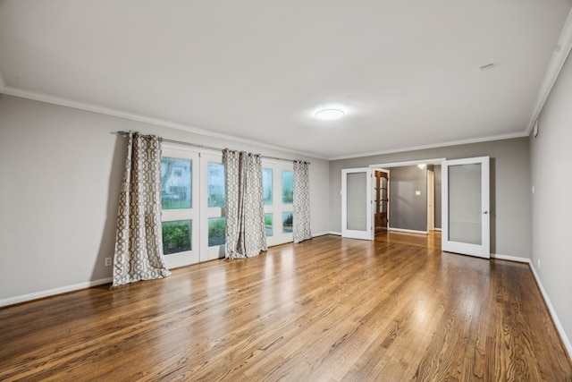 5659 Chevy Chase Dr, Houston, TX 77056 - spare room with french doors, crown molding, and wood finished floors