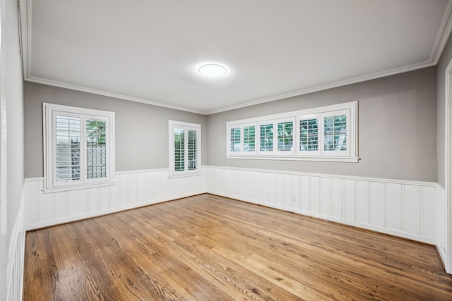 5659 Chevy Chase Dr, Houston, TX 77056 - unfurnished room featuring wainscoting, crown molding, and wood finished floors
