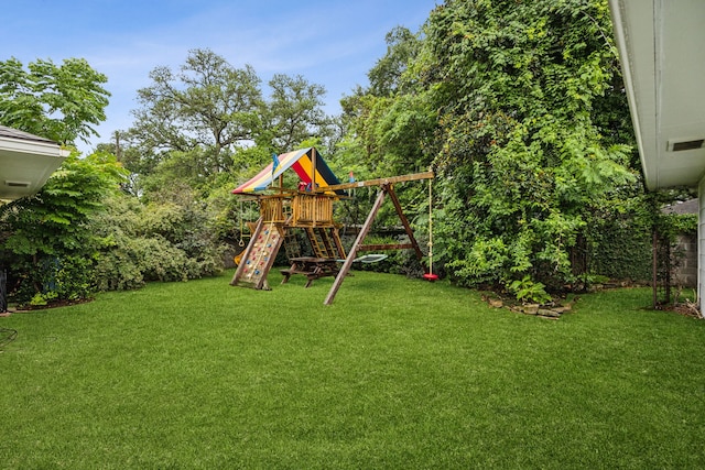 5659 Chevy Chase Dr, Houston, TX 77056 - view of grassy yard with a playground