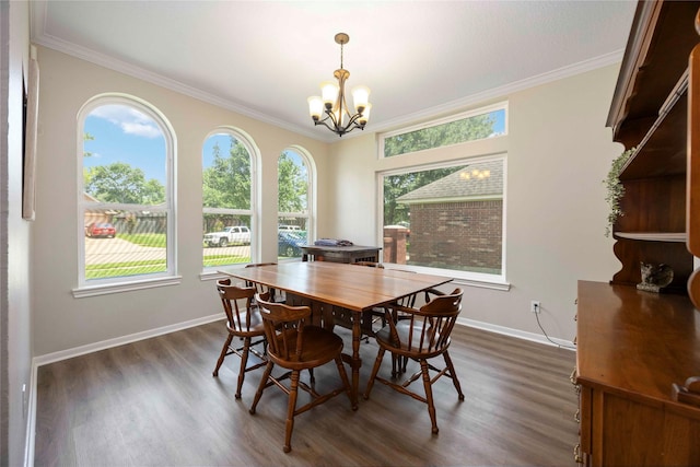 20315 Maple Village Dr, Cypress, TX 77433 - dining room with healthy amount of natural light, a chandelier, dark wood-style floors, and ornamental molding