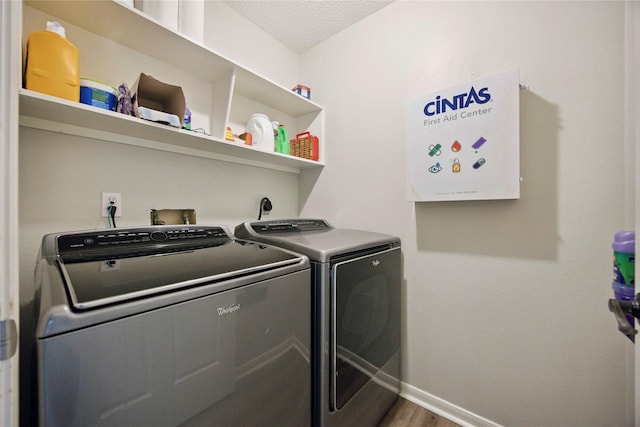 20315 Maple Village Dr, Cypress, TX 77433 - laundry area with separate washer and dryer and wood finished floors