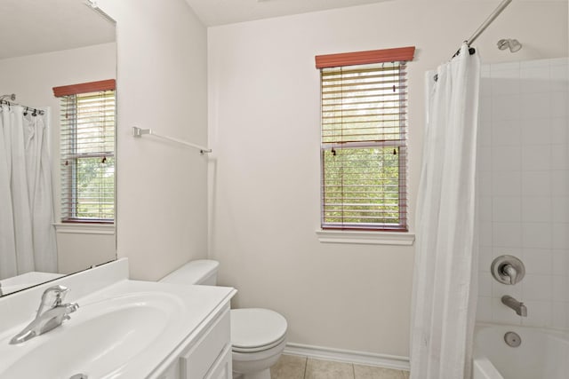 16210 Bloom Meadow Trl, Cypress, TX 77433 - bathroom featuring vanity, tile patterned floors, and shower / bath combo with shower curtain