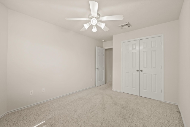 16210 Bloom Meadow Trl, Cypress, TX 77433 - unfurnished bedroom featuring light colored carpet, a closet, and a ceiling fan