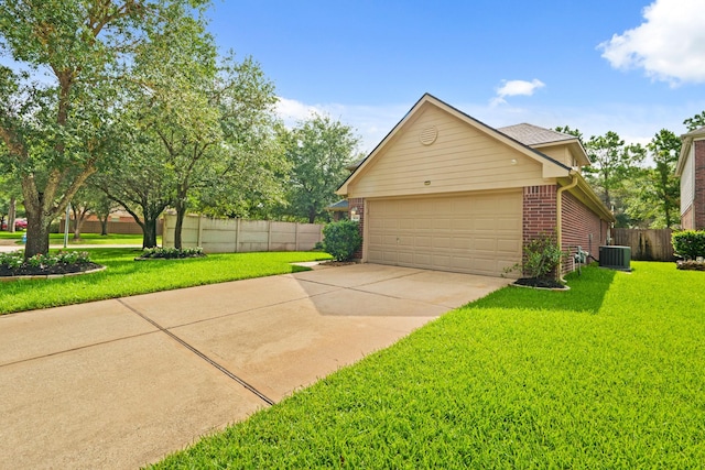 16210 Bloom Meadow Trl, Cypress, TX 77433 - view of side of property with brick siding, an attached garage, and concrete driveway