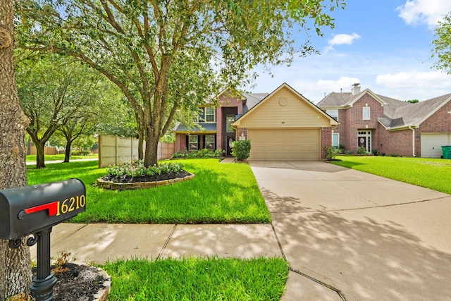 16210 Bloom Meadow Trl, Cypress, TX 77433 - traditional home with brick siding, a garage, and a front lawn