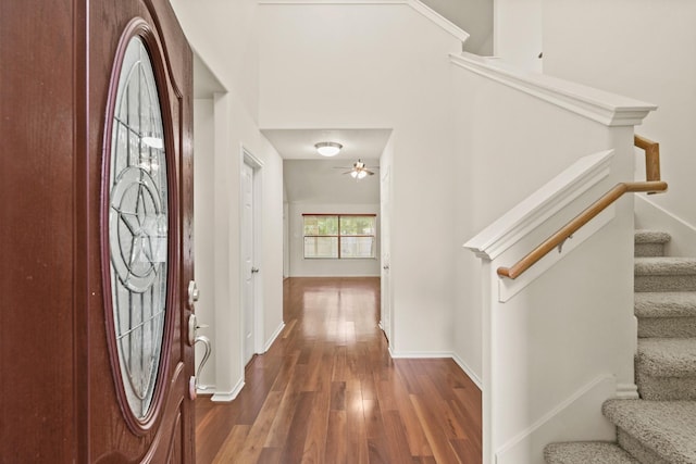 16210 Bloom Meadow Trl, Cypress, TX 77433 - entrance foyer with dark wood-type flooring and stairway
