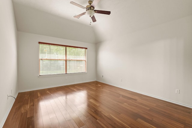 16210 Bloom Meadow Trl, Cypress, TX 77433 - spare room with a ceiling fan, lofted ceiling, and wood finished floors