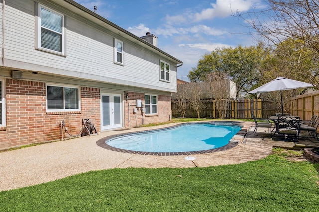 2310 Parkview Dr, Pearland, TX 77581 - view of swimming pool with french doors, a fenced backyard, and a patio area
