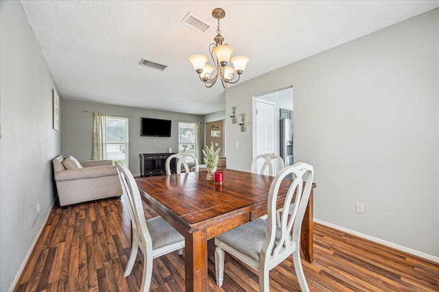 2310 Parkview Dr, Pearland, TX 77581 - dining space with a chandelier and wood finished floors