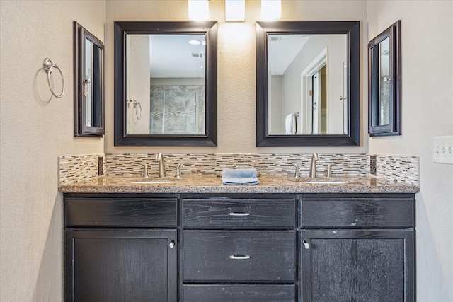 2310 Parkview Dr, Pearland, TX 77581 - full bath with double vanity and tasteful backsplash