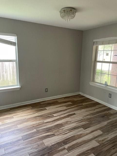 12326 Garden Gale Ln, Houston, TX 77044 - unfurnished room featuring wood finished floors
