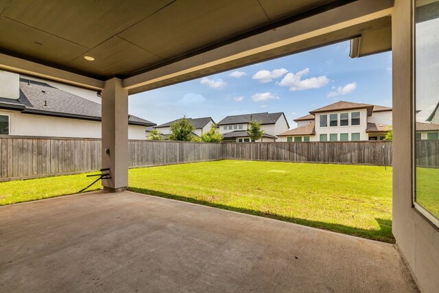 15643 Thirsty Horse Trl, Cypress, TX 77433 - fenced backyard featuring a patio area and a residential view
