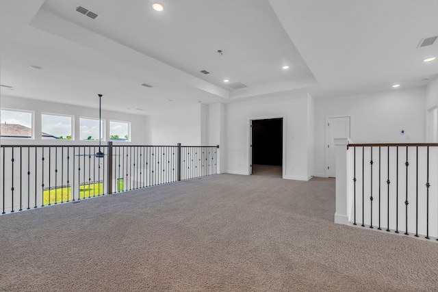 15643 Thirsty Horse Trl, Cypress, TX 77433 - carpeted spare room featuring a raised ceiling and recessed lighting