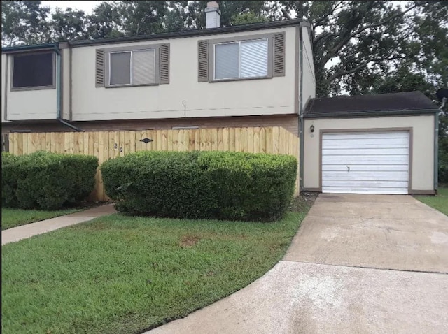 5915 Fairmeadow Dr, Beaumont, TX 77707 - view of front of house featuring driveway and a garage