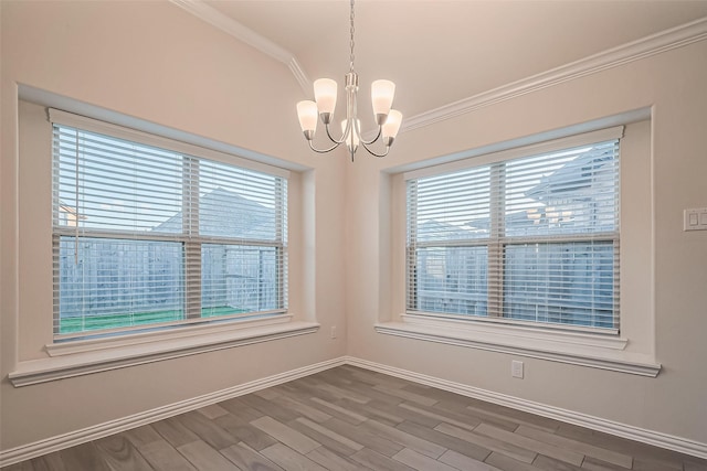 1111 Teamriddle Way, Richmond, TX 77406 - unfurnished room featuring a chandelier, wood finished floors, and ornamental molding