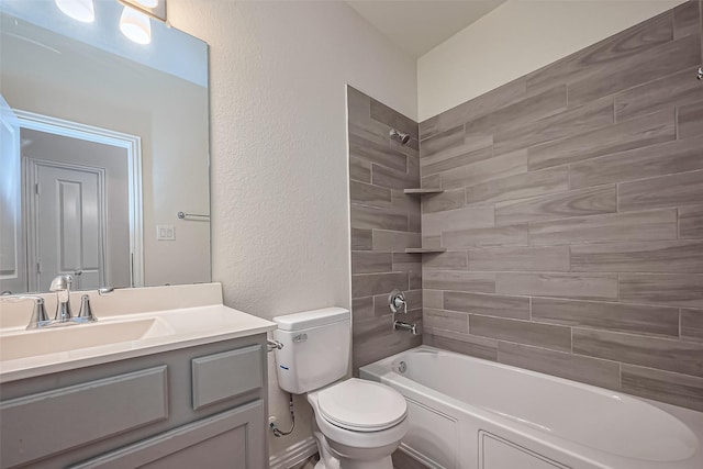 1111 Teamriddle Way, Richmond, TX 77406 - bathroom with vanity, a textured wall, and tub / shower combination