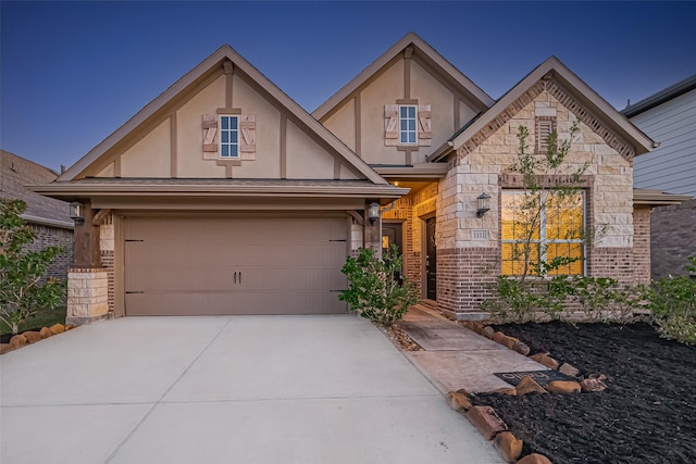 1111 Teamriddle Way, Richmond, TX 77406 - view of front of property with stucco siding, stone siding, and concrete driveway