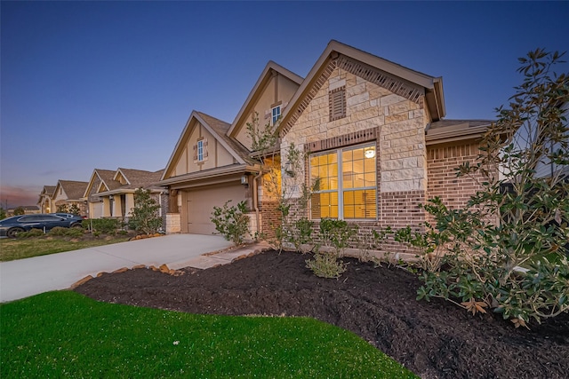 1111 Teamriddle Way, Richmond, TX 77406 - view of front of property featuring stone siding, stucco siding, and driveway