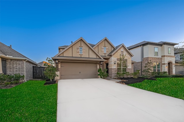1111 Teamriddle Way, Richmond, TX 77406 - view of front of house featuring stucco siding, concrete driveway, a front yard, and stone siding