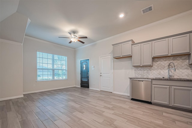 1111 Teamriddle Way, Richmond, TX 77406 - kitchen with dishwasher, gray cabinets, ceiling fan, decorative backsplash, and light wood-style flooring