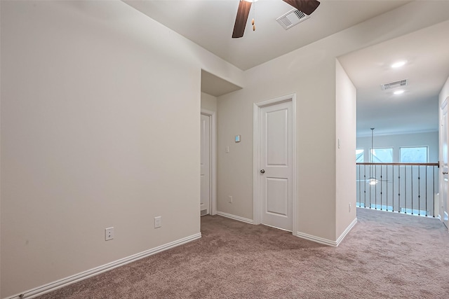1111 Teamriddle Way, Richmond, TX 77406 - empty room with ceiling fan and carpet floors